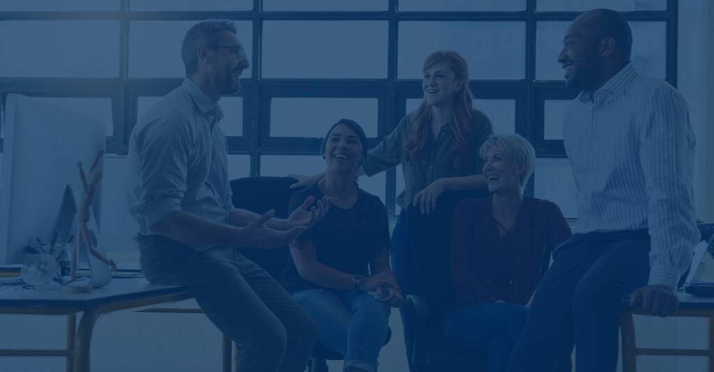 Group of employees talking to plan sponsor