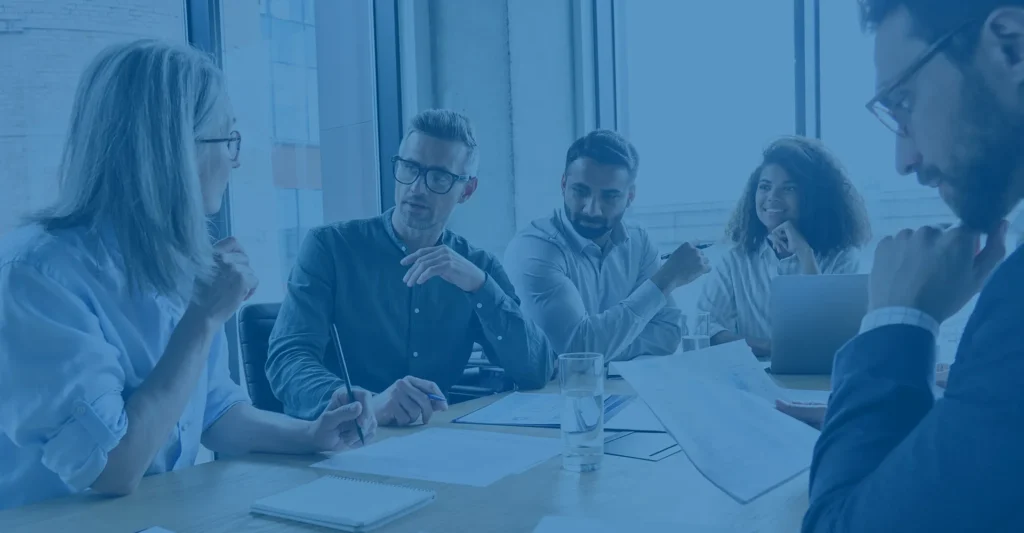 Professionals in a meeting having a discussion