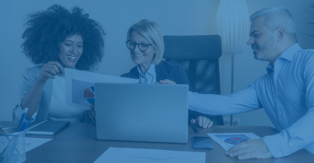 Three People Conducting a Client Referral Meeting