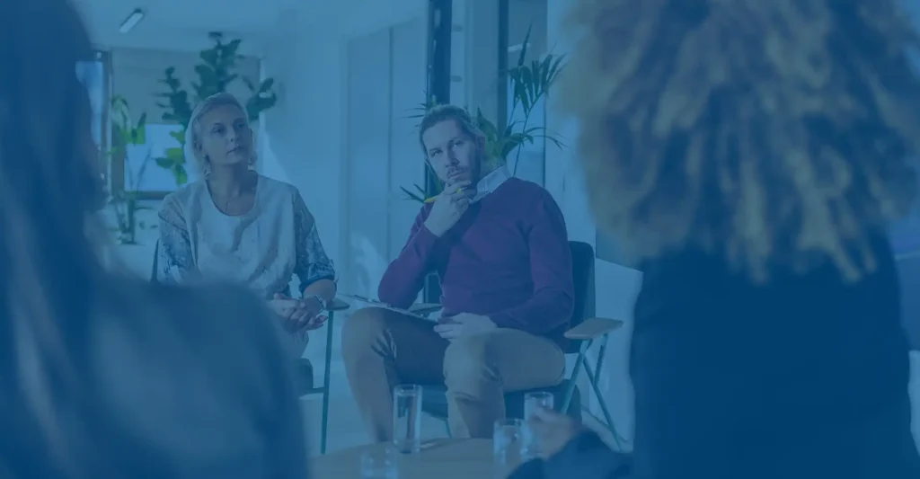 Group of people discussing on a panel